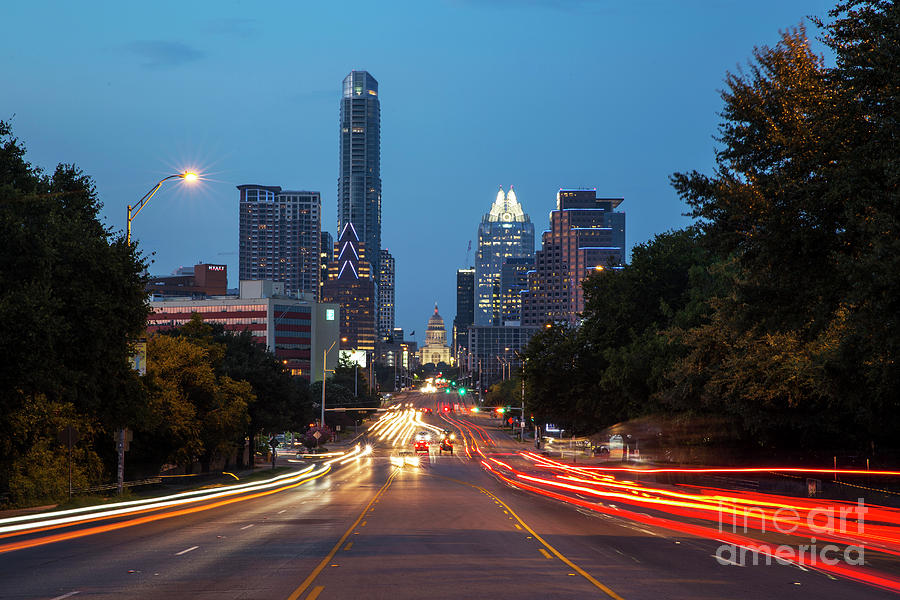 Austin Skyline Photograph - The Austin Skyline and Texas Capitol at dusk as seen from South Congress Avenue  by Herronstock Prints