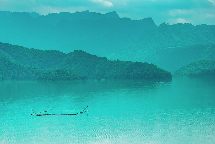 The beautiful reservoir scenery in summer, Guilin, China. Photograph by Carl Ning