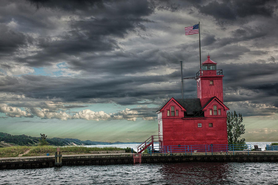 The Big Red Lighthouse On Lake Michigan by Ottawa Beach Photograph by Randall Nyhof