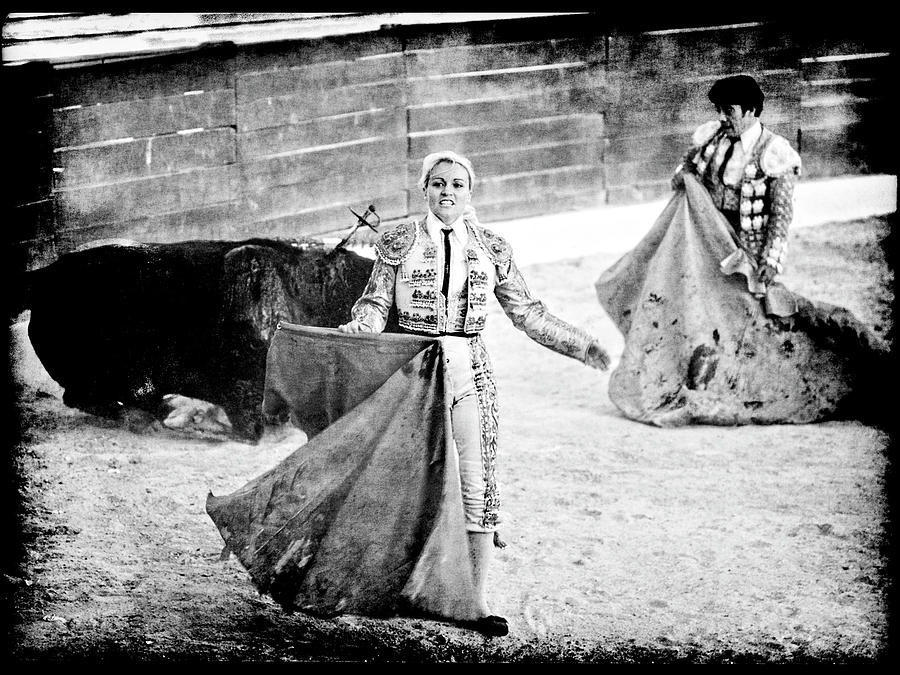 The Blonde, the bull and the Coup de Gras Bullfight Photograph by Jennifer Wright