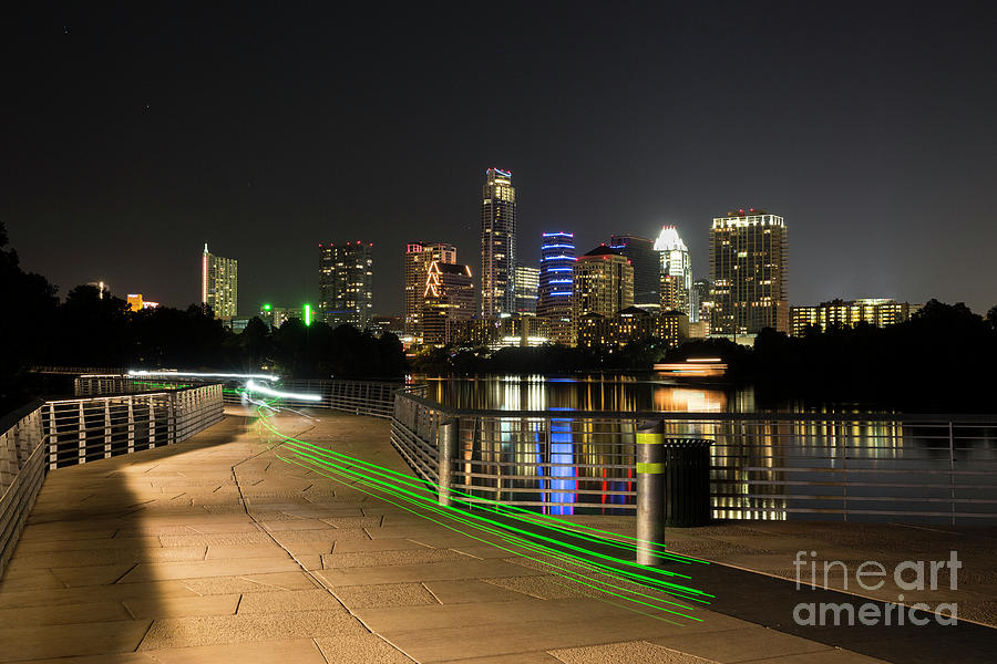 Austin Photograph - The Boardwalk Trail at Lady Bird Lake offers glimmering views of the downtown Austin skyline by Dan Herron