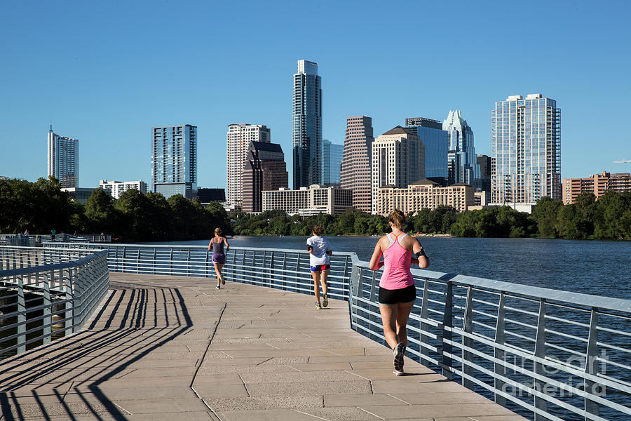 Train Photograph - The Boardwalk Trail is the official running trail for Austins runners and marathon and half marathon training programs with stunning views Austin cityscape skyline by Dan Herron