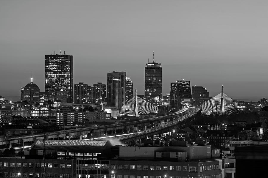 The Boston Skyline lit up blue on Hanukkah at Sunset Black and White Photograph by Toby McGuire