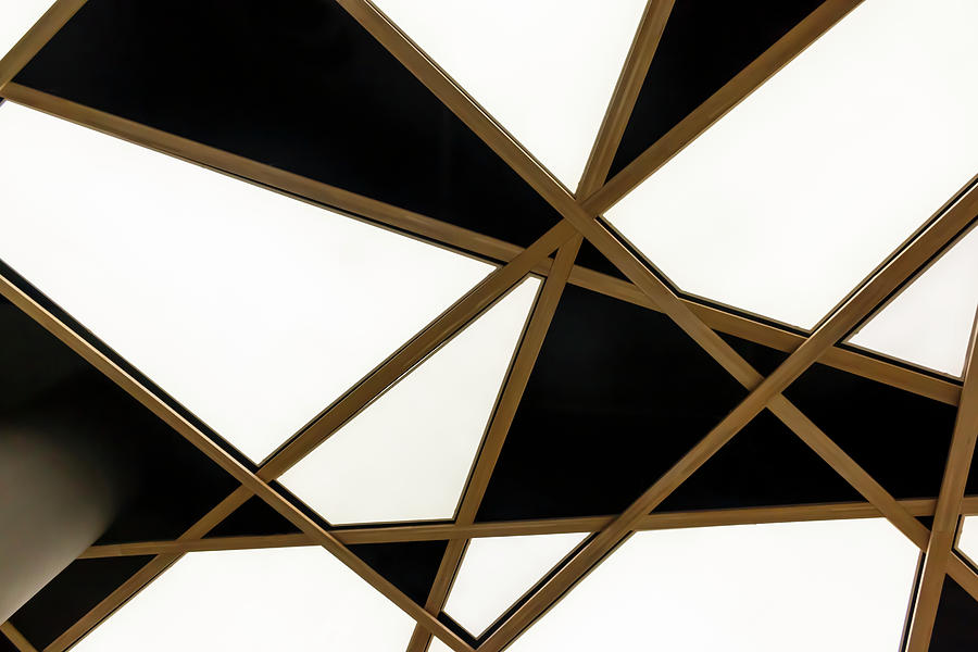 The bottom view of the modern white triangular ceiling Photograph by Mykola Churpita Pixels