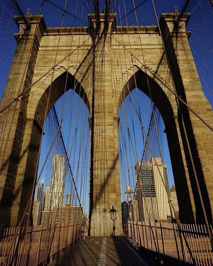 Sunrise Photograph - The Brooklyn Bridge Stands Strong With by Picture This Photography