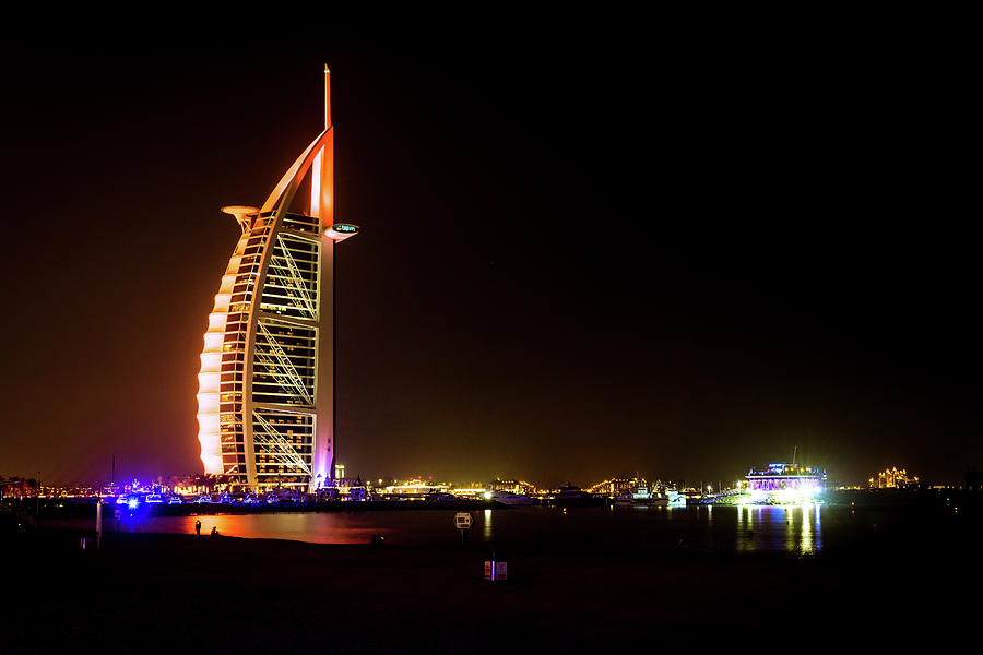 The Burj Al Arab at Night Photograph by Andrew Matwijec
