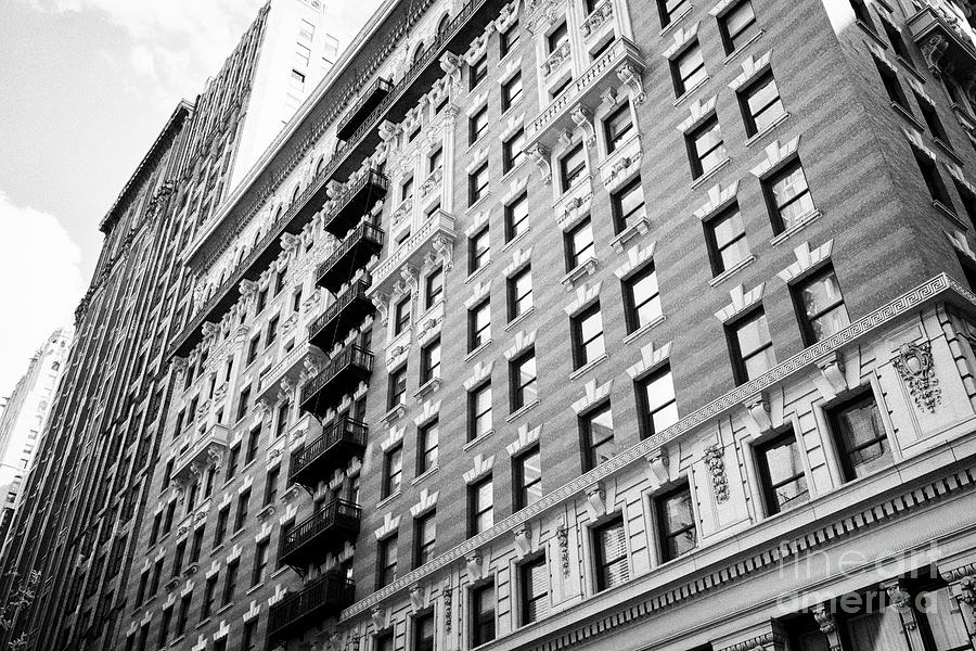 Architecture Photograph - the burton building with mixed design architecture architectural details New York City USA by Joe Fox