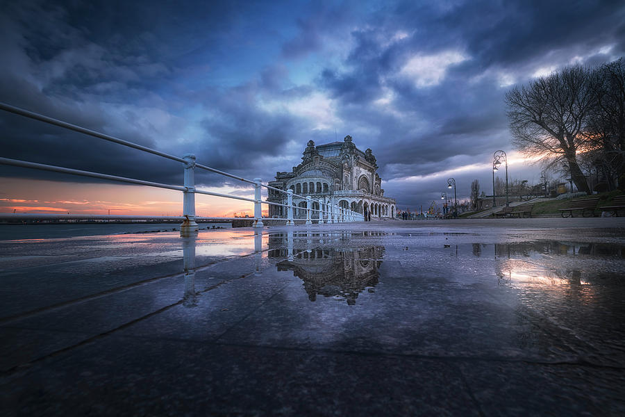 Sunset Photograph - The Casino reflection by Adrian Malanca