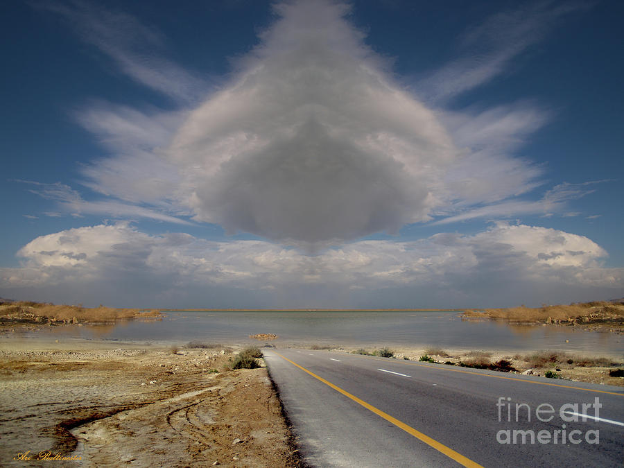 The cloudy flying saucer  Photograph by Arik Baltinester