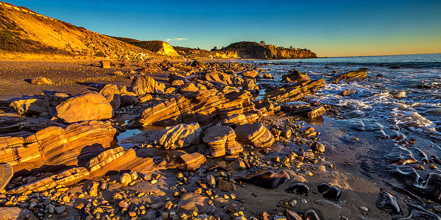 Sunset Photograph - The Crystal Cove by Peter Tellone