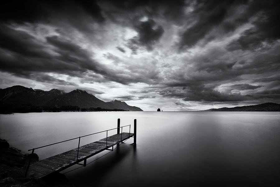 The dark side of the lake Photograph by Dominique Dubied