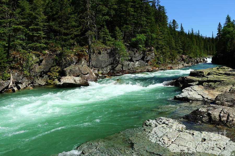 The Deep Green Waters Of McDonald River Photograph by Christiane Schulze Art And Photography