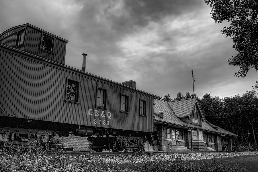 The Depot Under Cloudy Skies Black and White Photograph by Dale Kauzlaric