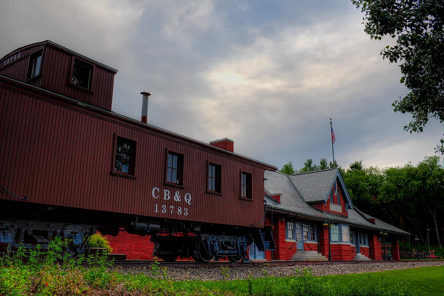 The Depot Under Cloudy Skies Photograph by Dale Kauzlaric