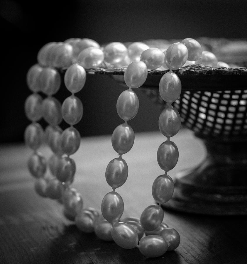 The Drama of Pearls Photograph by Patrice Zinck