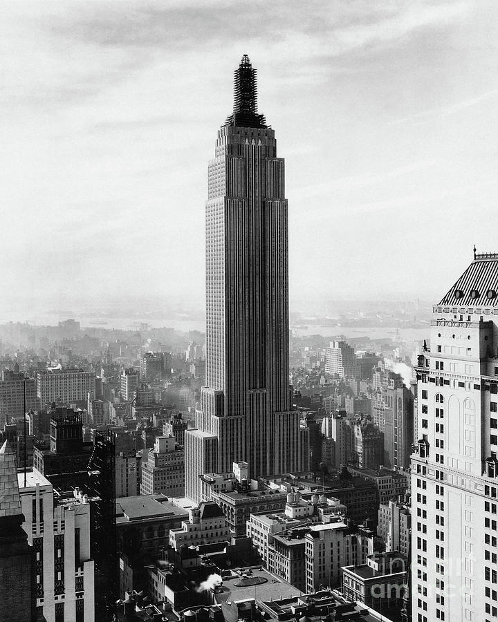 The Empire State Building Under Construction Photograph by Jon Neidert
