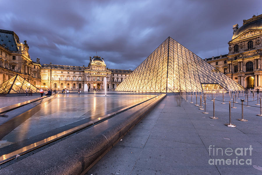 The famous pyramid at the Louvre palace in Paris Photograph by Didier Marti
