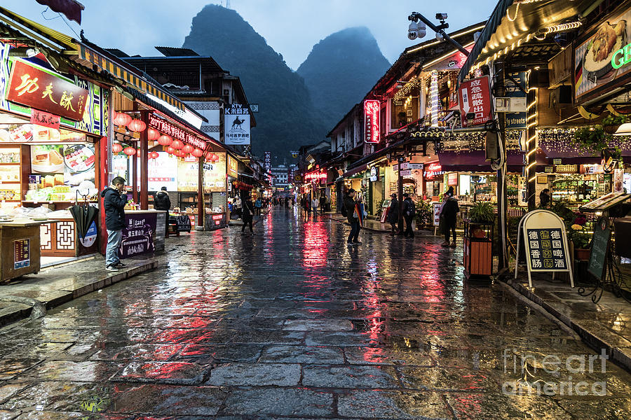 The famous West street in Yangshuo near Guilin in south China Photograph by Didier Marti