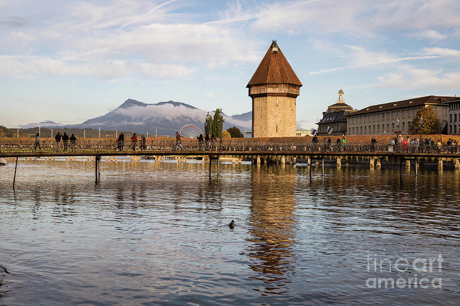 The famous wooden Chapel bridge in Lucerne Photograph by Didier Marti