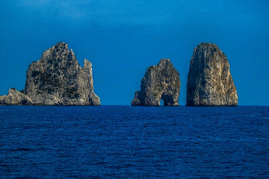 The  Faraglioni Rocks at the Island of Capri Photograph by Marilyn Burton