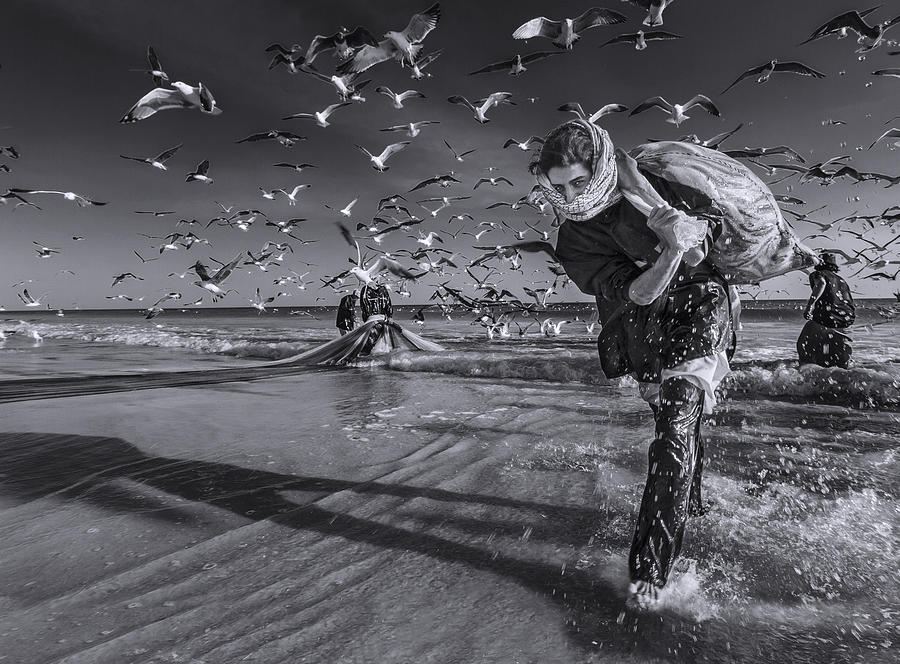 Black And White Photograph - The Fast Fisher by Malik Alnabhani