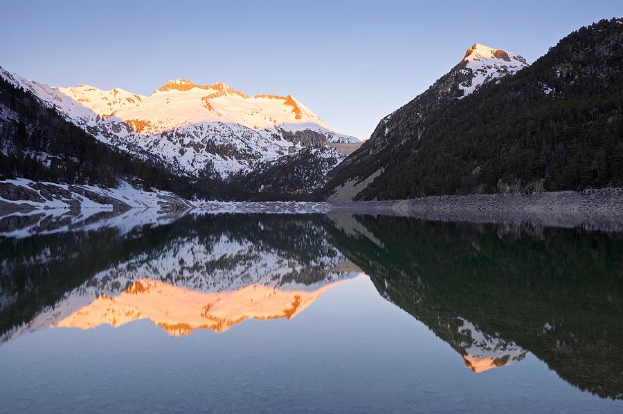 The first Golden light at Lac Doredon Photograph by Stephen Taylor