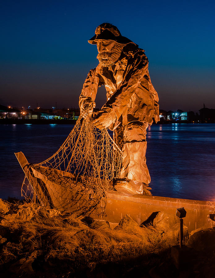 The Fisherman Photograph - The Fisherman after Nightfall by Greg Nyquist