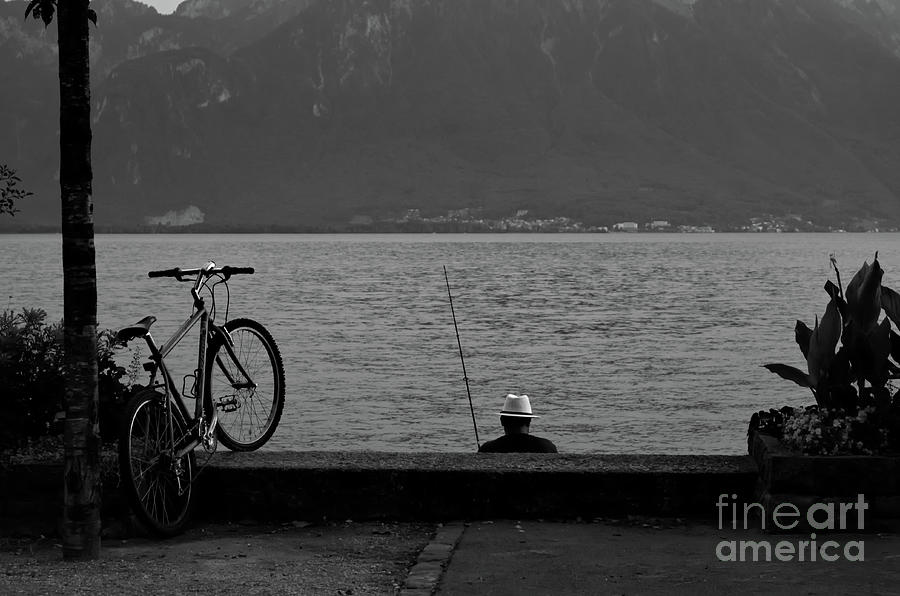 The Fisherman And His Bicycle Photograph by Michelle Meenawong