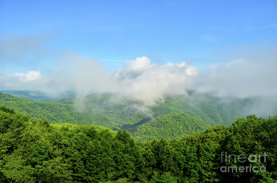 The Fog Rises Over the Bluestone Gorge - Pipestem State Park Photograph by Kerri Farley