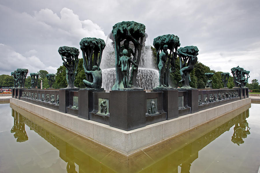 The Fountain with tree groups in the Vigeland Park Photograph by Aivar Mikko