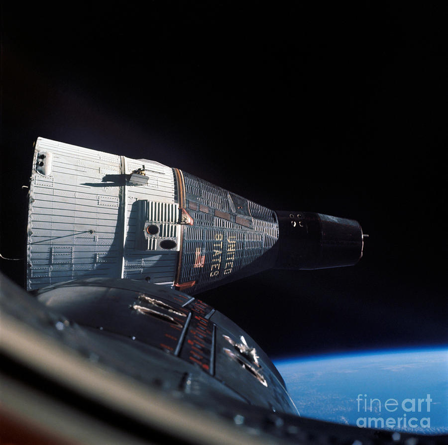 The Gemini 7 Spacecraft In Earth Orbit Photograph by Stocktrek Images