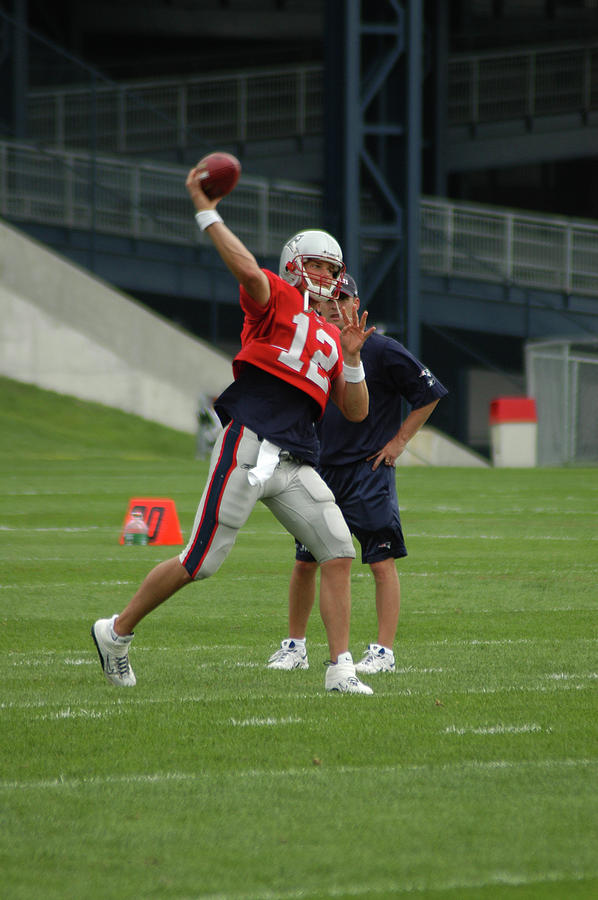 Tom Brady Photograph - The GOAT Passes in Camp by Mike Martin