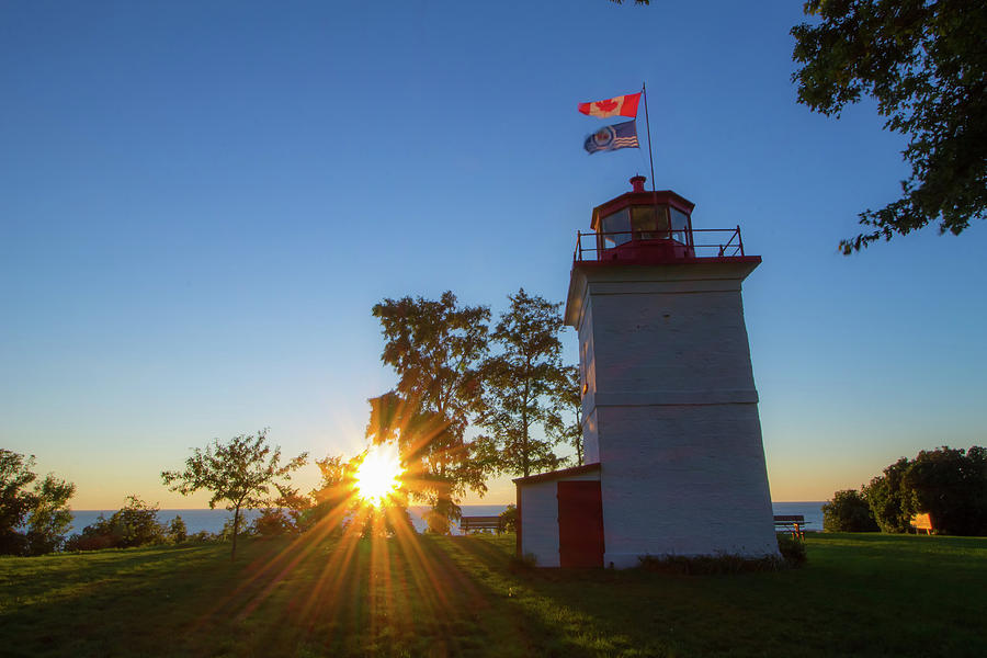 The Goderich Lighthouse at sunset Photograph by Jay Smith