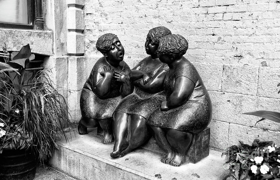 The Gossipers in Montreal Photograph by John Rizzuto