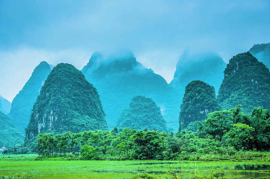 The karst rural scenery in raining, Guilin, China. Photograph by Carl Ning