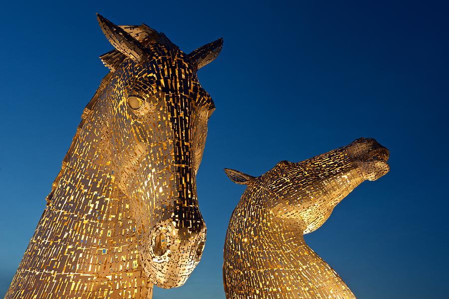 The Kelpies at dusk Photograph by Stephen Taylor