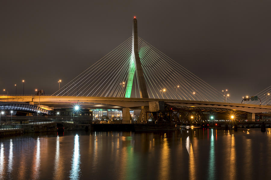 The Leonard P Zakim bridge lit up in green for St Patricks Day Reflection Photograph by Toby McGuire