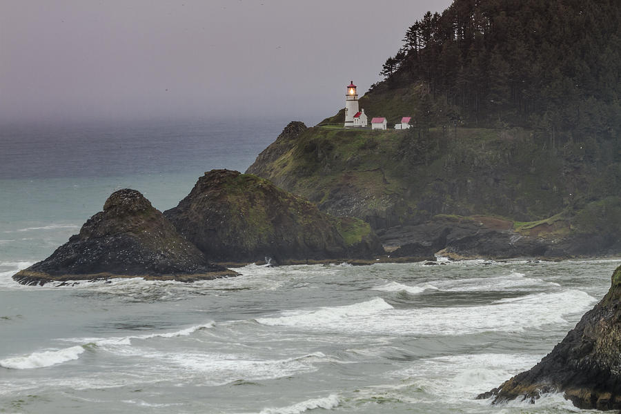 The Light is On at Heceta Head Lighthouse Photograph by Teri Virbickis