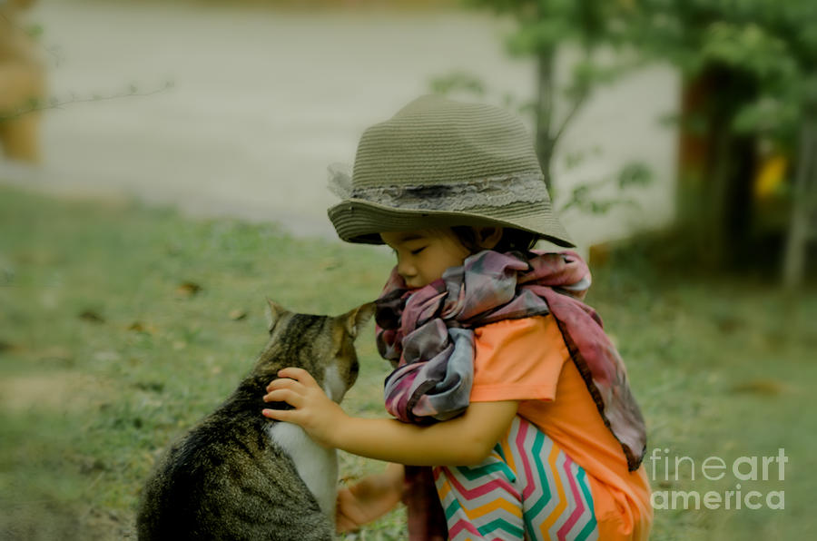 The Little Girl And Her Cat Photograph by Michelle Meenawong