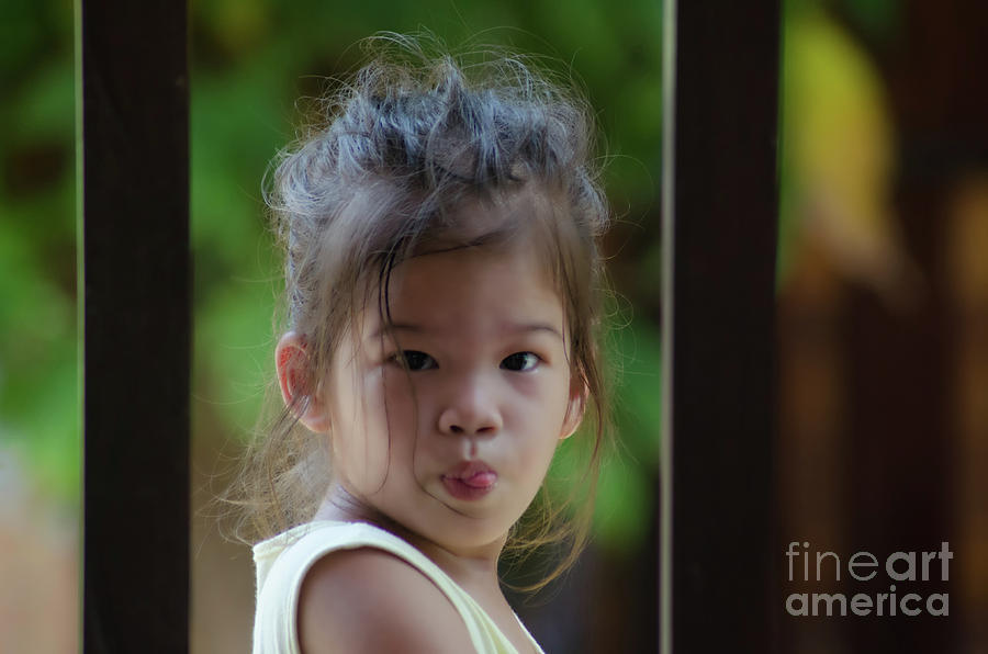 The Little Girl With A Sharp Tongue Photograph by Michelle Meenawong