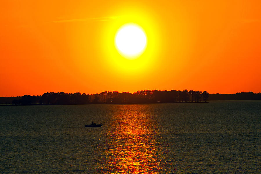 Sunset Photograph - The Lonesome Fisherman by Reginald McDowell