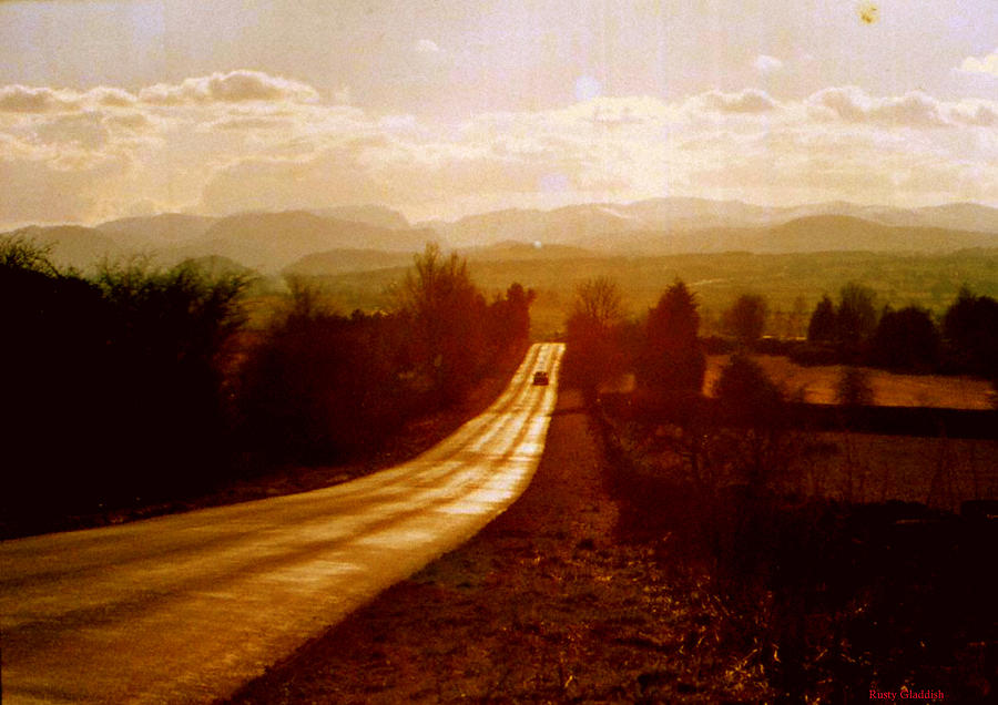 The long and lonely road....... Photograph by Rusty Gladdish