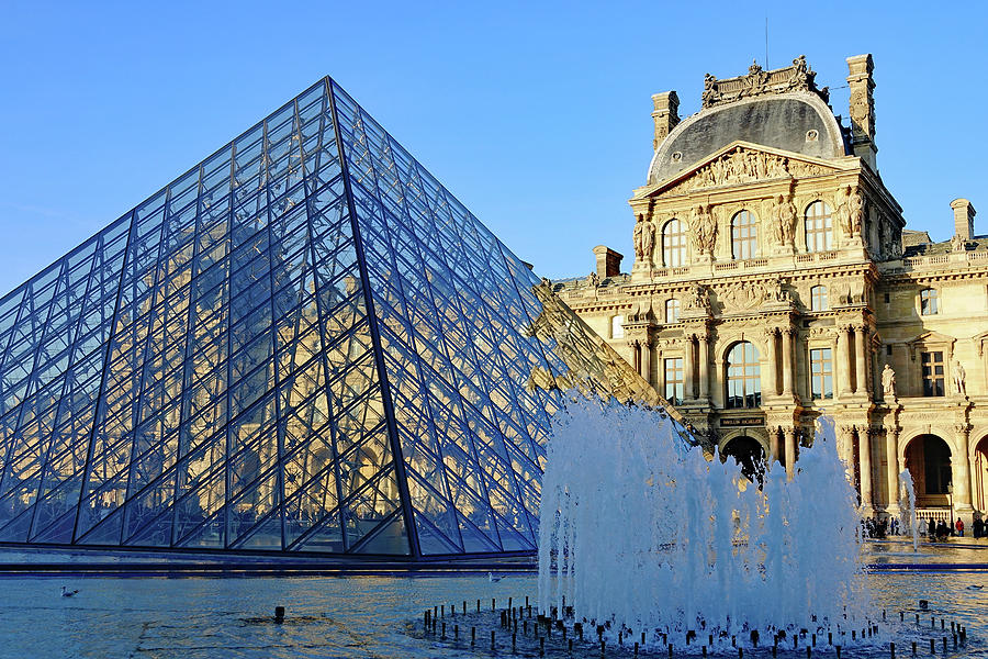 The Louvre Pyramid And Richelieu Pavilion in Cour Napoleon In Paris, France Photograph by Rick Rosenshein
