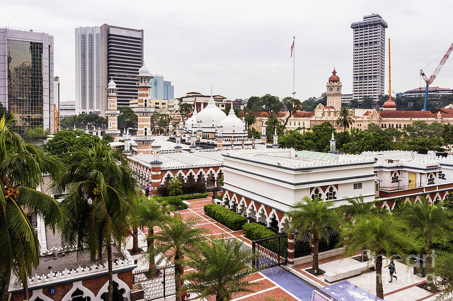 The Masjid Jamek or Friday mosque and the Sultan Abdul Samad buil Photograph by Didier Marti