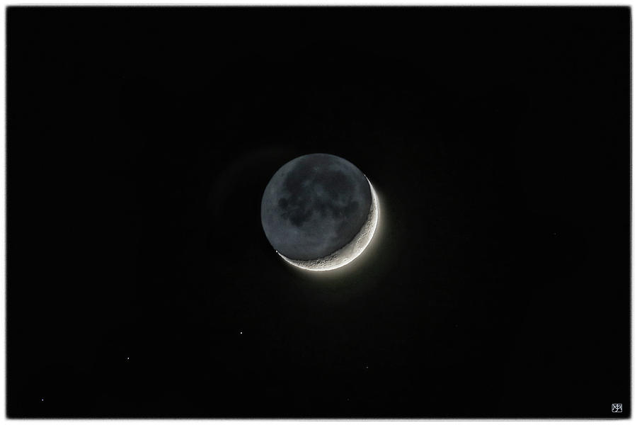 The Moon--Light and Dark Photograph by John Meader