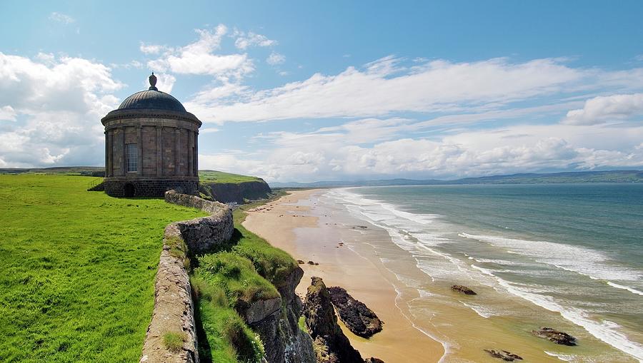 The Mussenden Temple at Downhill Castle above Magilligan Strand ...