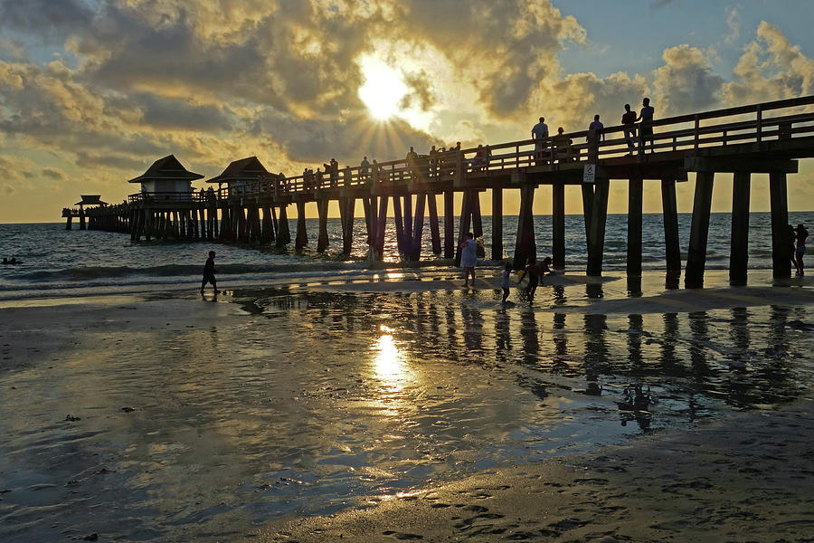 Naples pier at sunset Naples Florida Ripples #1 Photograph by Toby McGuire