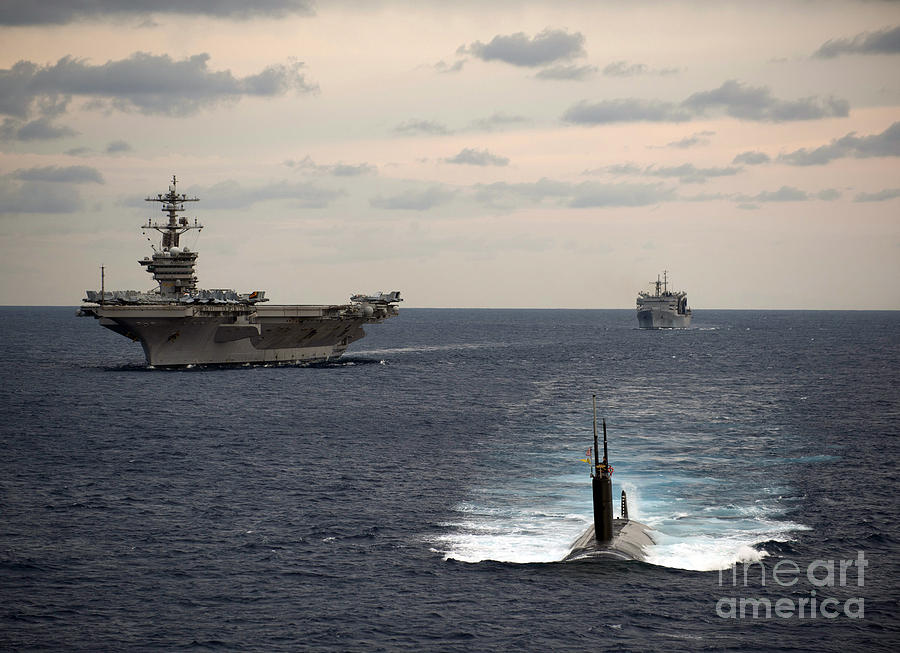Us Navy Painting - The Nimitz-class aircraft carrier USS Carl Vinson and a submarine by Celestial Images