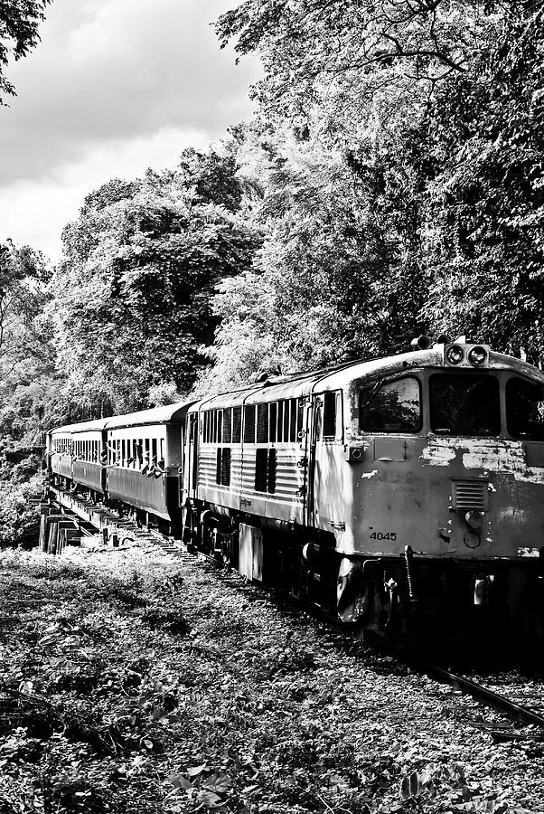 Transportation Photograph - The old railway line that is black and white by Sarayut Mathavetchathum