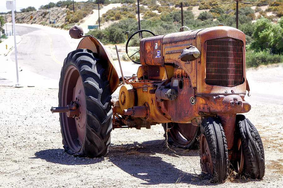 The Old Yellow Farm Tractor Photograph by Gene Parks